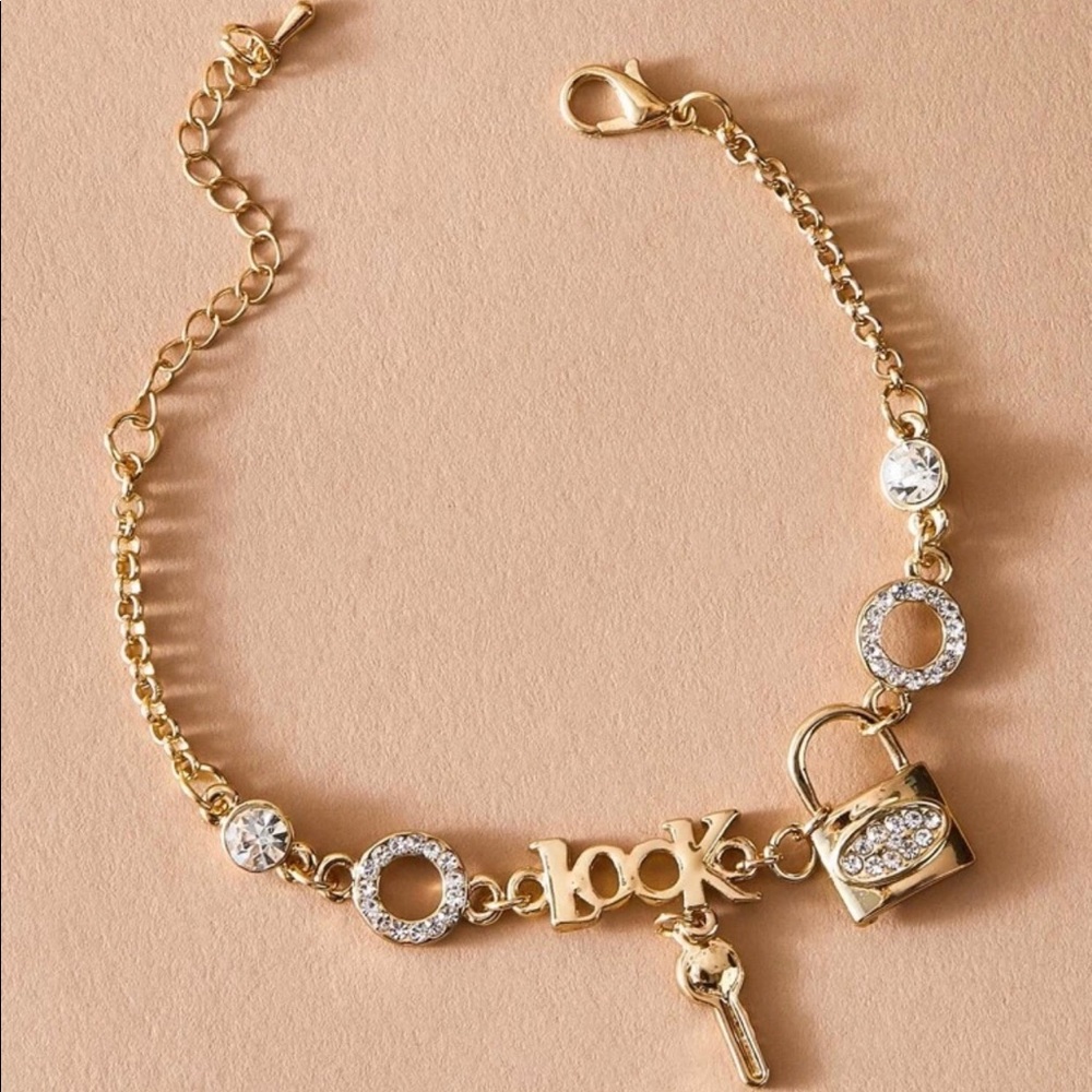 Gold charm bracelet